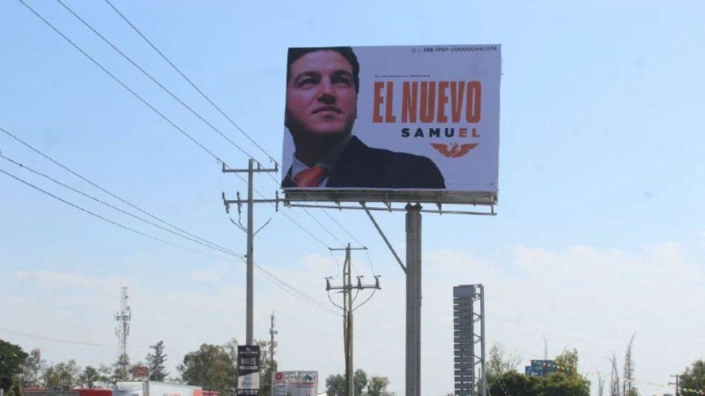 Political Campaign Billboard on a Highway, Showing a Man in a Suit with the Text 'el Nuevo Samuel'. - Justicia Regia